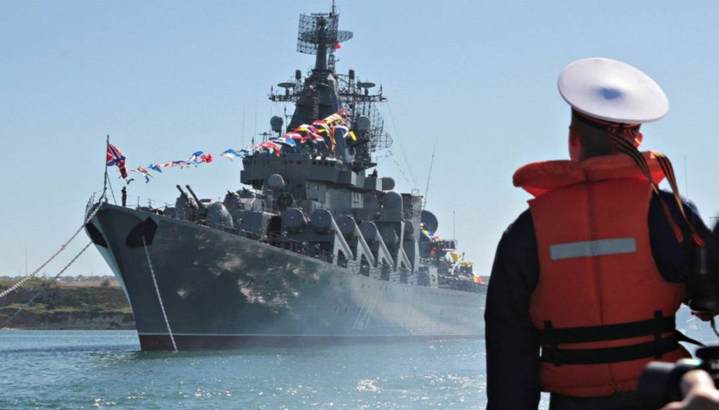 98623277_FILE-PHOTO-A-sailor-looks-at-the-Russian-missile-cruiser-Moskva-moored-in-the-Ukrainian